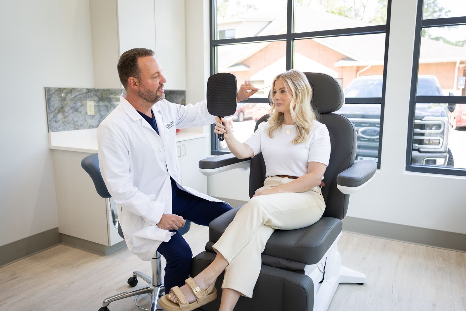 woman with blonde hair looking right