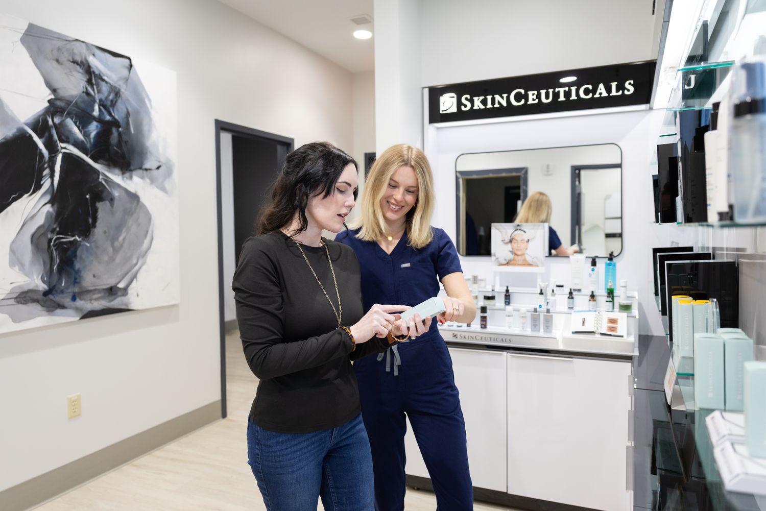Consultation at a skincare boutique with products.