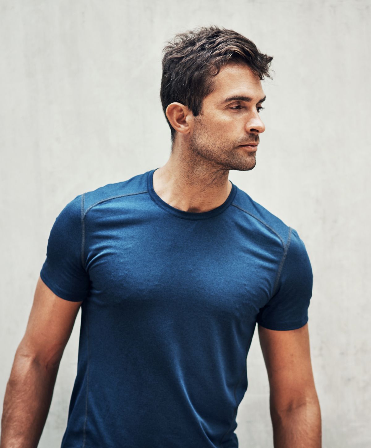 Savannah NeoGraft Model wearing a blue shirt