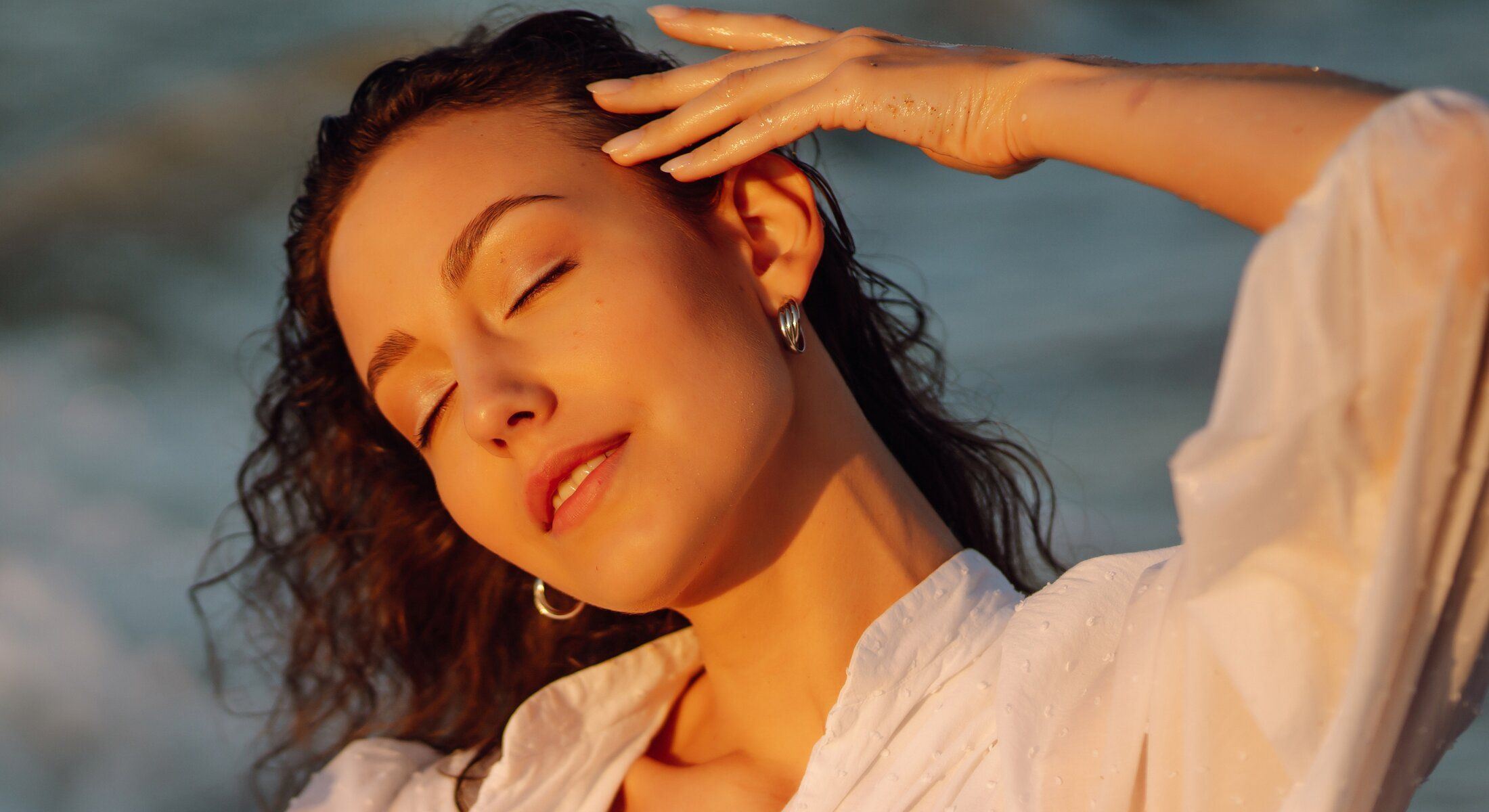 savannah earlobe repair model touching her head